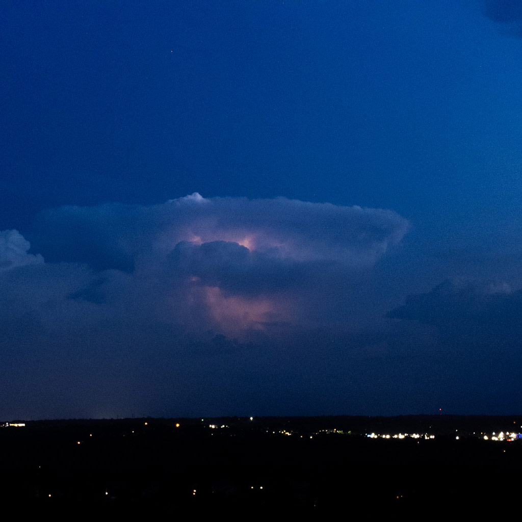A bolt of lightning deep within a thunder cloud