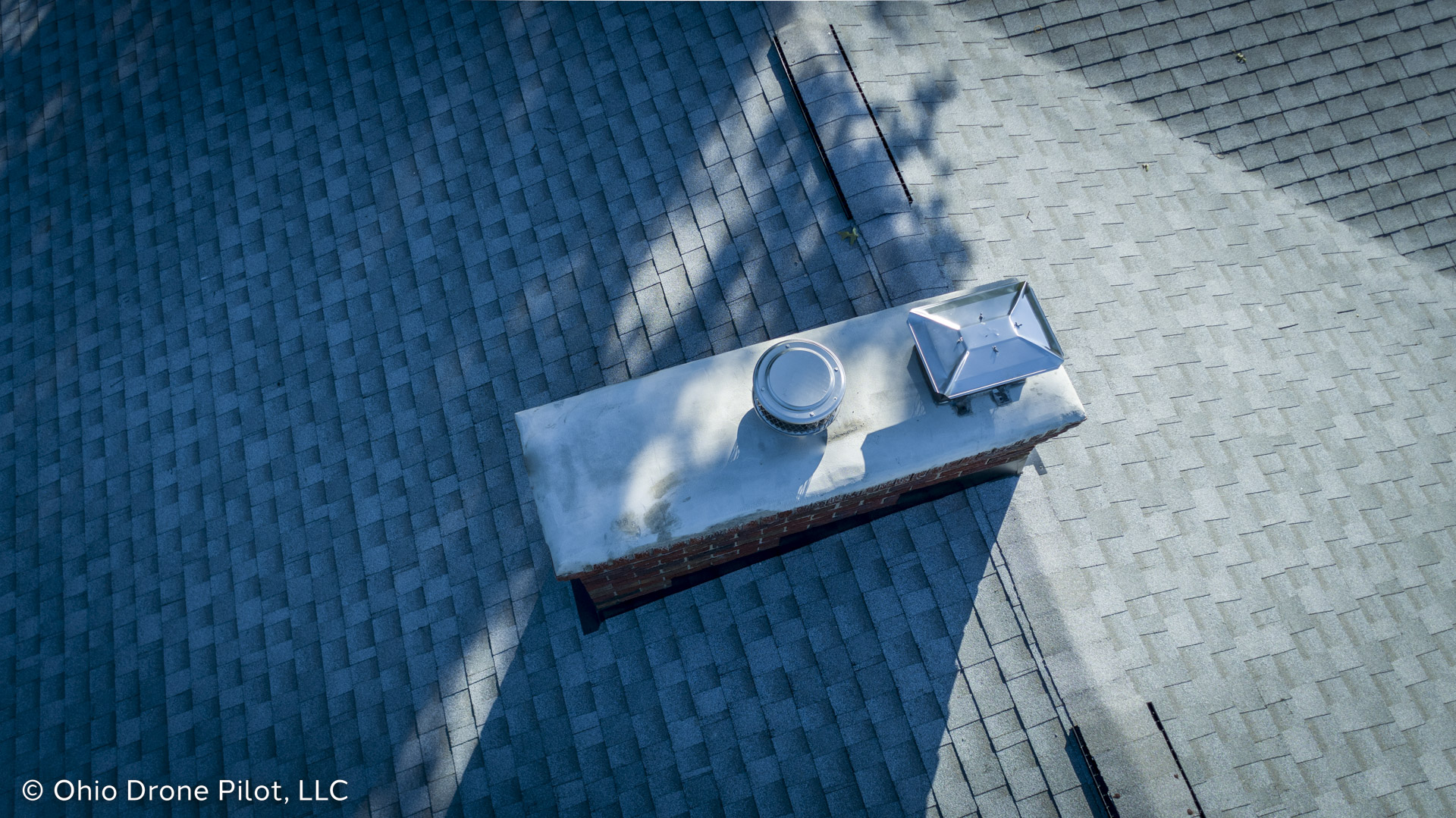 Updated masonry work on a chimney cap, © Ohio Drone Pilot, LLC