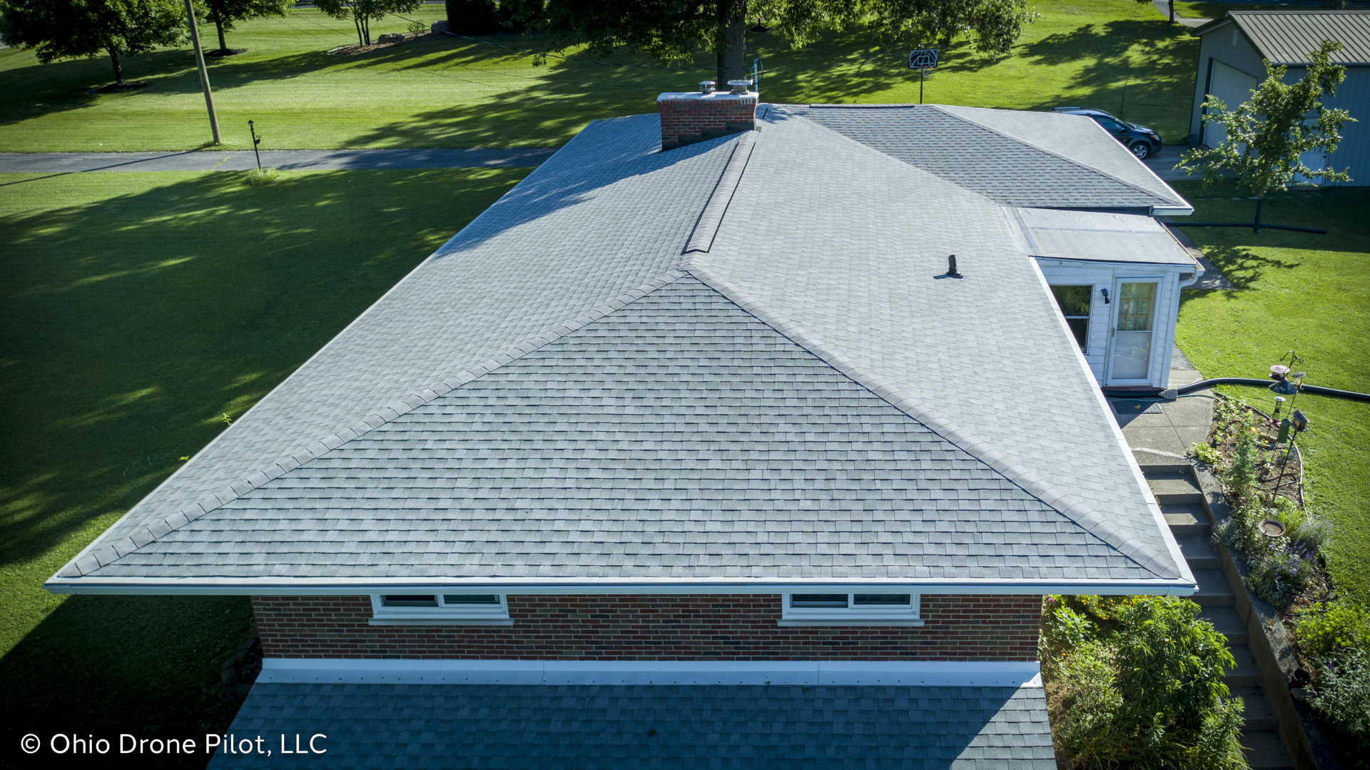 Low aerial view of a newly installed roof, © Ohio Drone Pilot, LLC