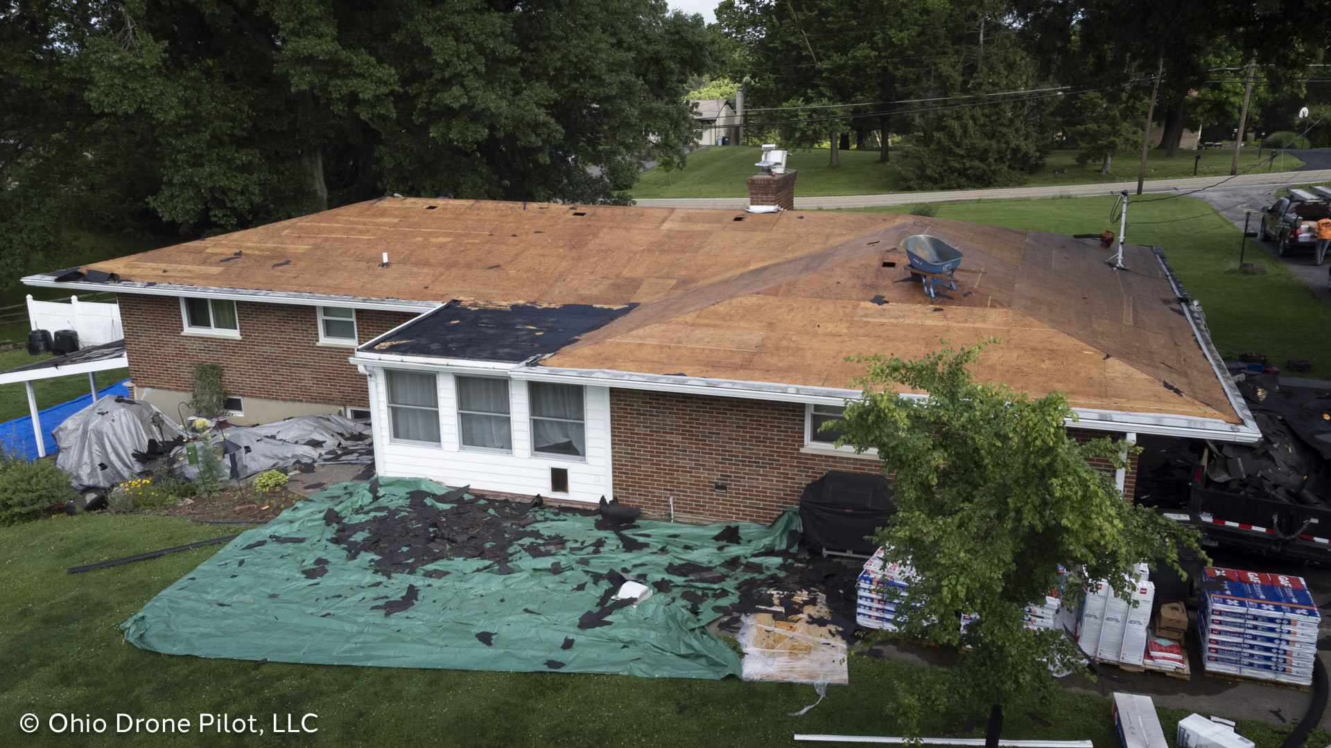 Low angle aerial shot of a roof stripped down to bare wood, © Ohio Drone Pilot, LLC