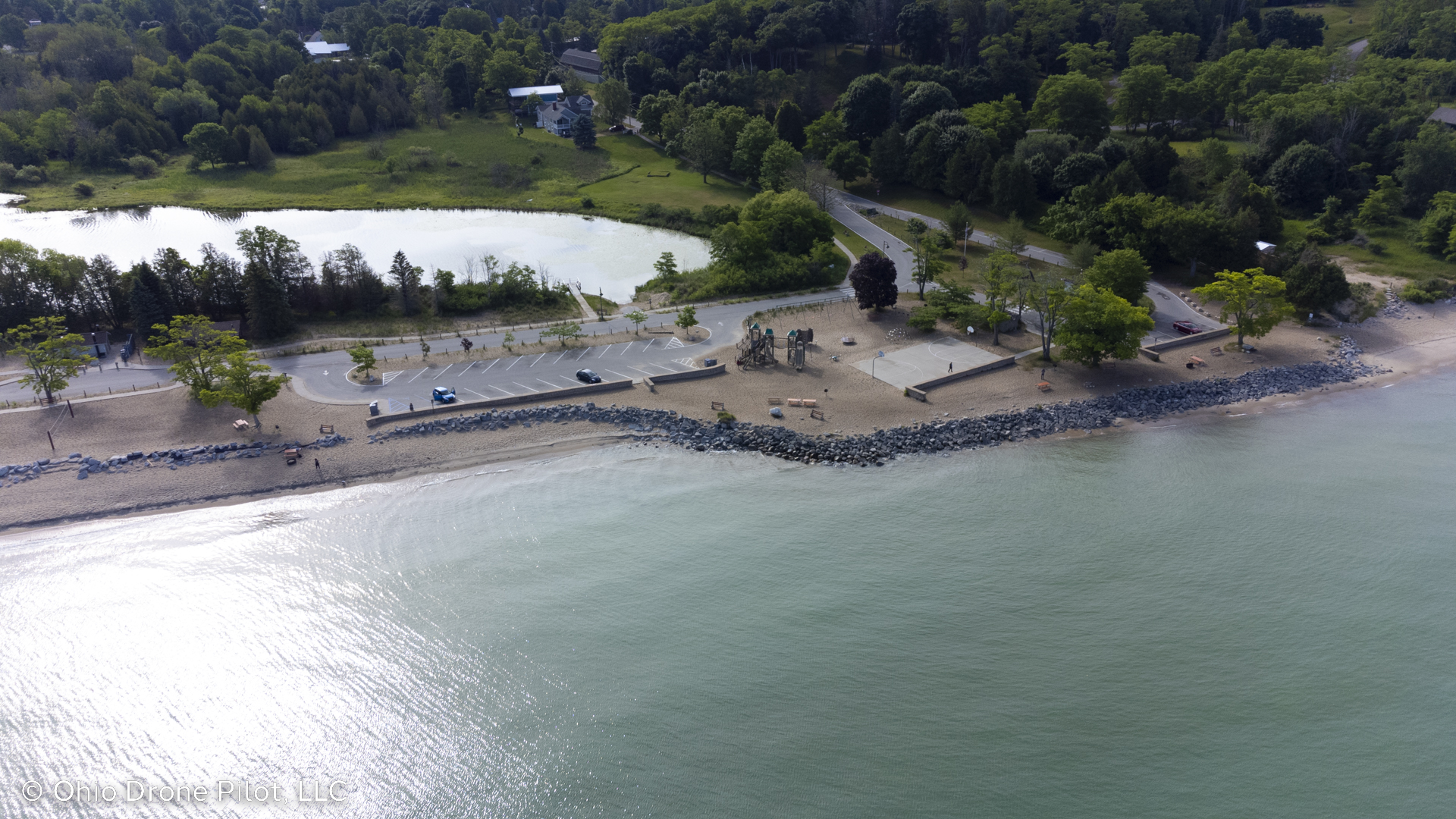 Arial photo over Lake Michigan looking back at Empire Beach