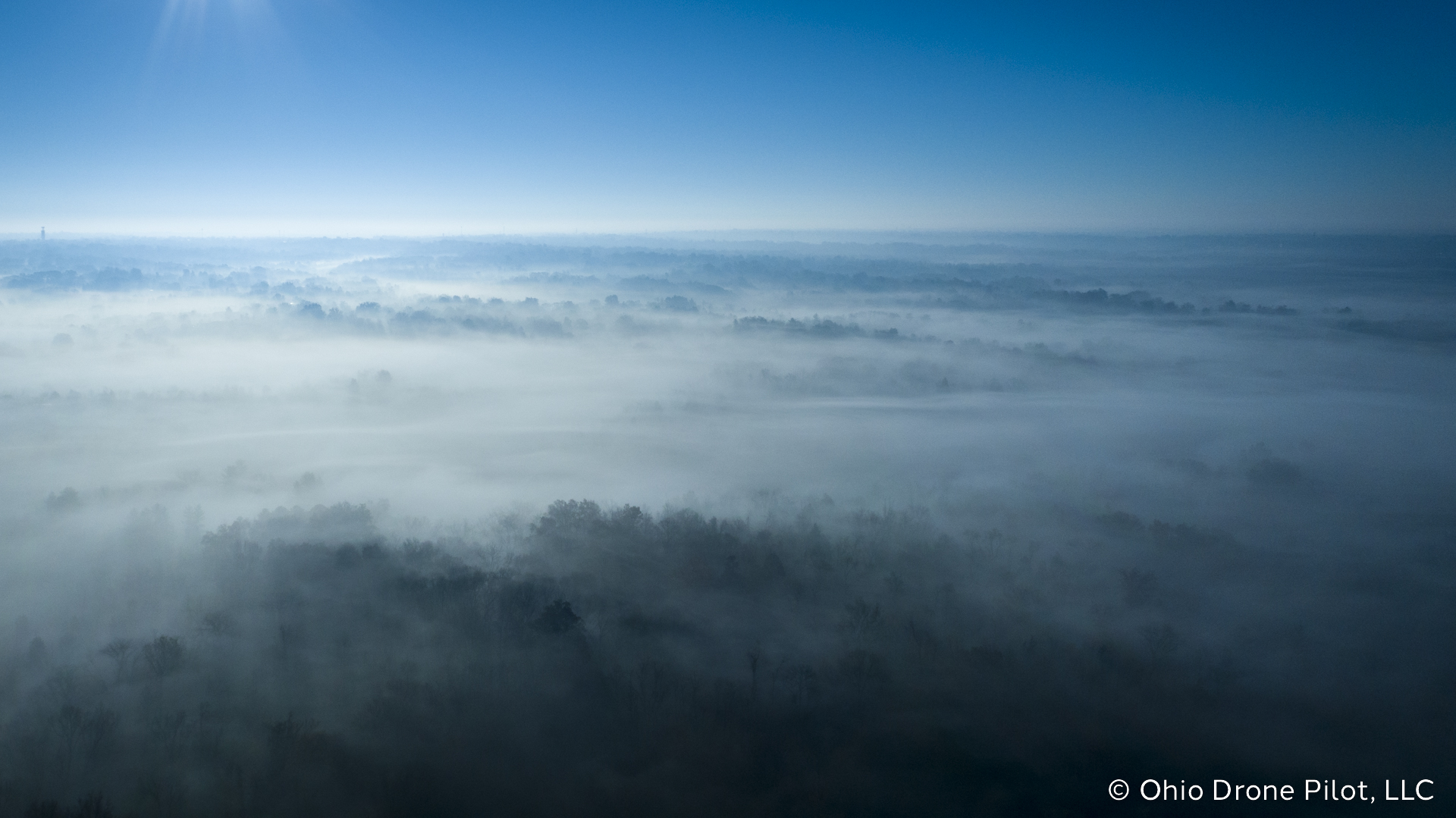 Fog fills the suburban hills of Colerain, Ohio