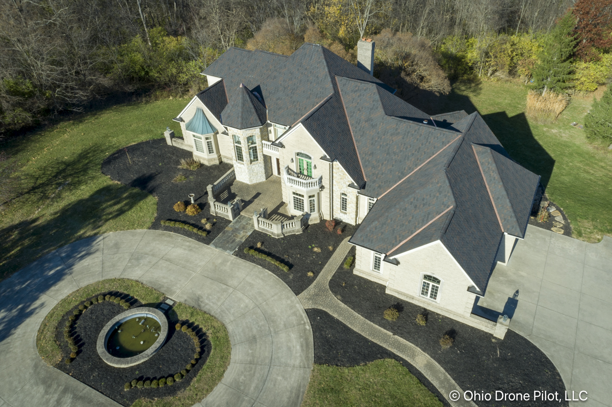 Aerial photo featuring the detailed angles of an ornate roof