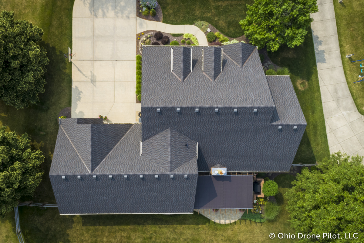 Straight down view of a newly installed roof on a beautiful 2 story home. Photography by Ohio Drone Pilot, LLC